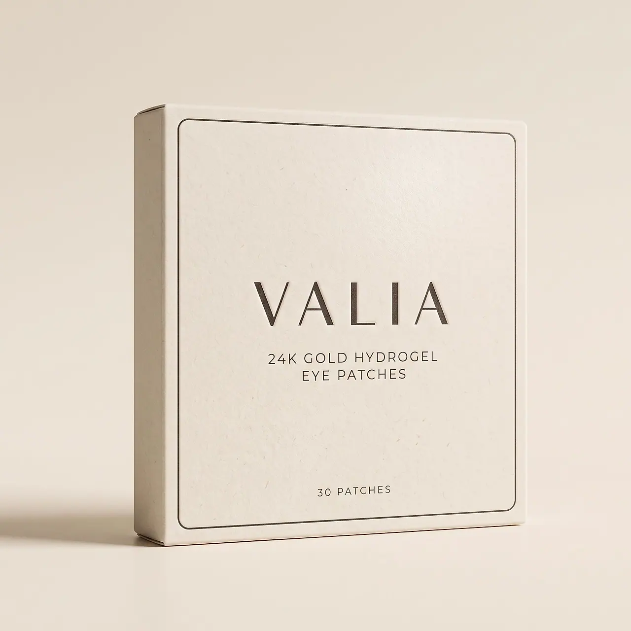 The VALIA box, front face: uncoated cream card with a fine charcoal keyline.
